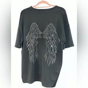 Grey top with wings on back